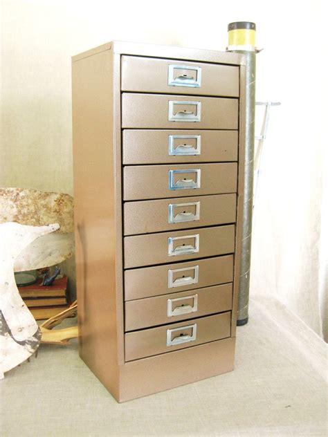 small cabinet with metal drawers